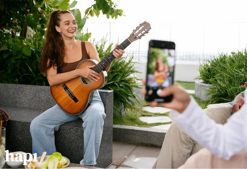an influencer playing guitar