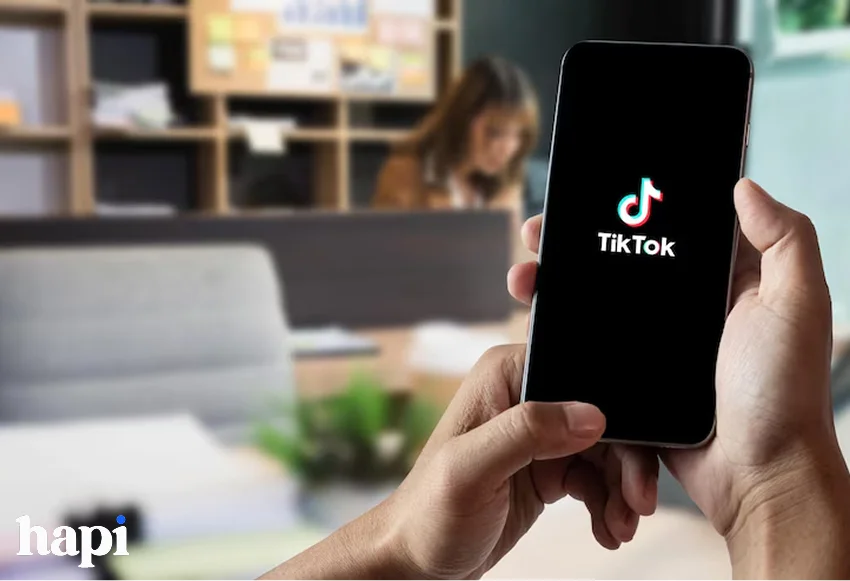 a person opening TikTok App