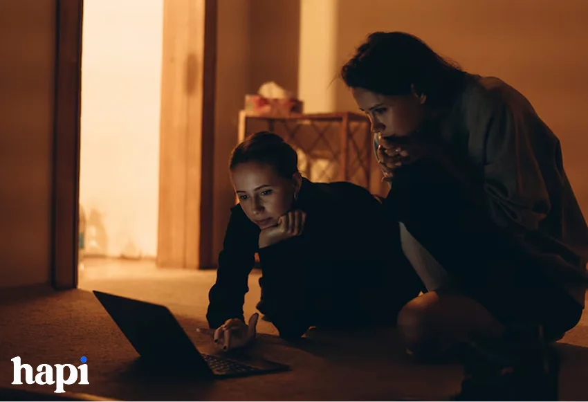 two girl scrolling on social media