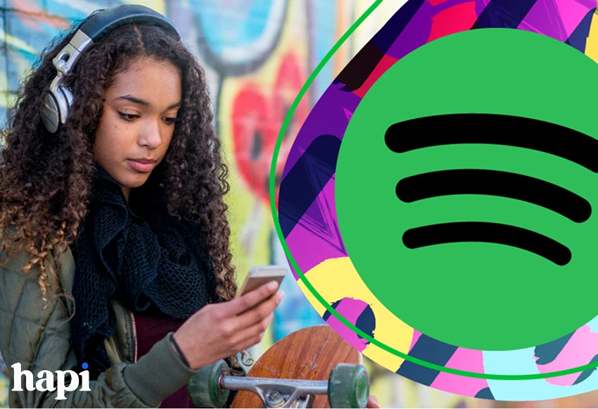a woman using Spotify