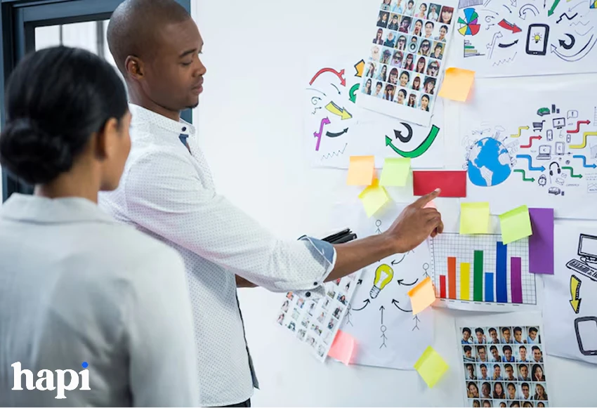 two people working on a digital marketing task