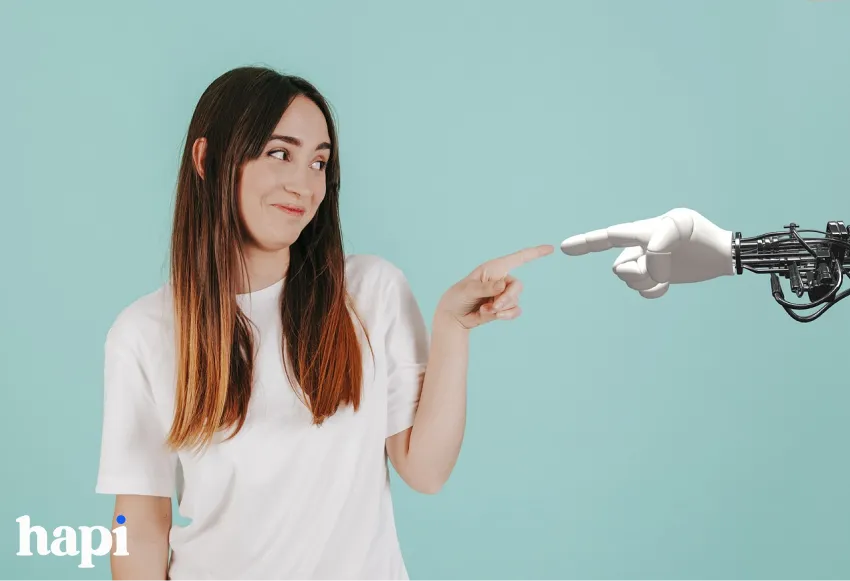 A human and a robot touching fingers